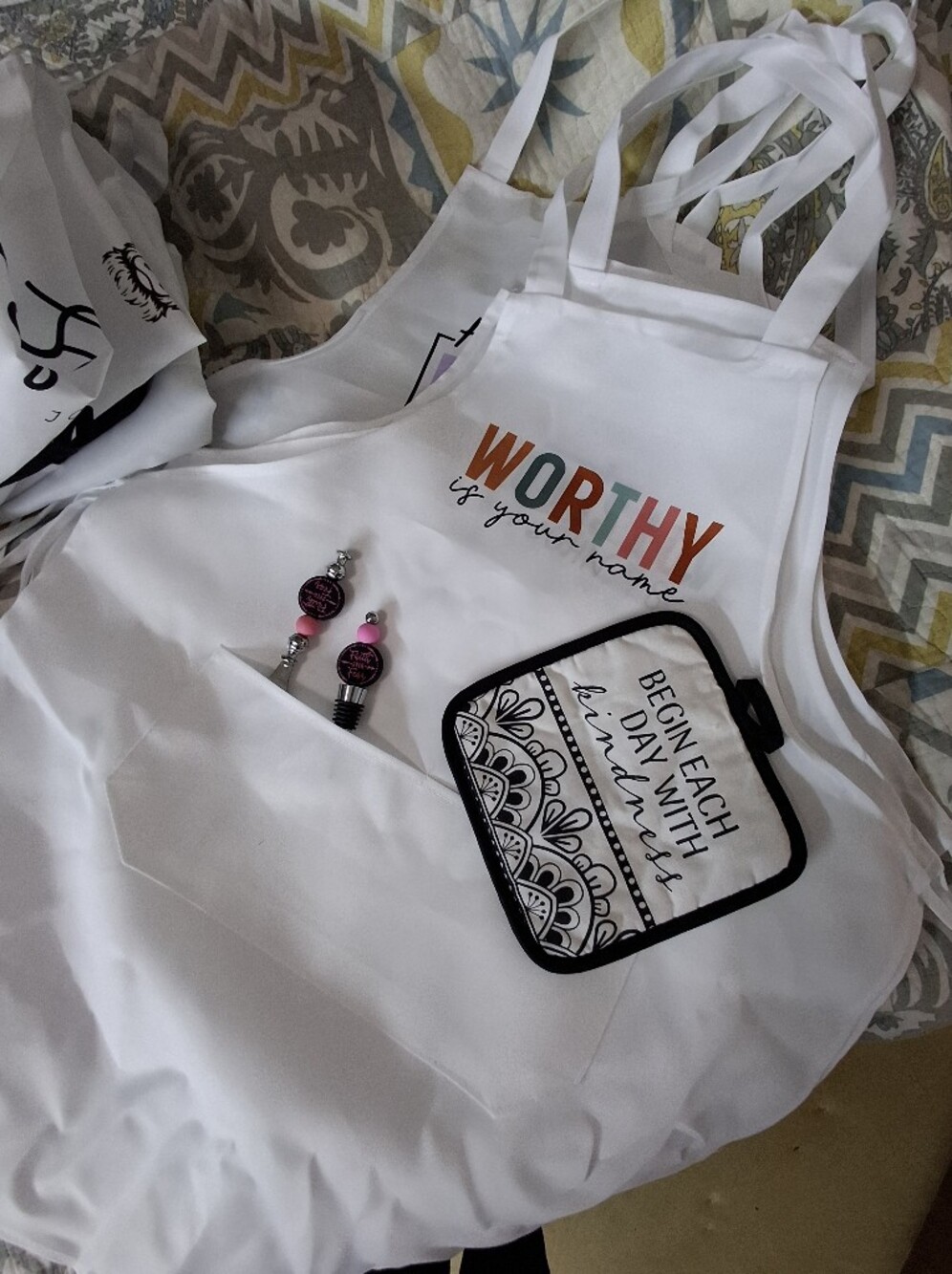 Worthy Multi-Color Graphic Apron with Pink Bead Earrings